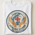 HEALING HANDS SEE THE WORLD | Inspiring Travel Nurse T-Shirt - close up