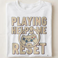 PLAYING HELPS ME RESET | Humorous Gamer T-Shirt - close up