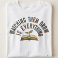 WATCHING THEM GROW IS EVERYTHING | Heartwarming Teacher T-Shirt - close up