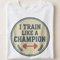 I TRAIN LIKE A CHAMPION | Motivational T-Shirt for Winners - close up