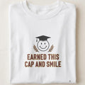 EARNED THIS CAP AND SMILE | Graduation T-Shirt for Achievers - close up