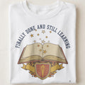 FINALLY DONE AND STILL LEARNING | Funny PhD Graduation T-Shirt - close up