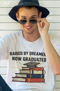 RAISED BY DREAMERS NOW GRADUATED | First Gen Graduate T-shirt - accurate print preview