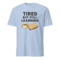 TIRED BUT STILL LEARNING | Funny Nursing Student T-Shirt - flat