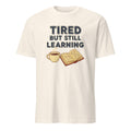 TIRED BUT STILL LEARNING | Funny Nursing Student T-Shirt - flat