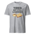 TIRED BUT STILL LEARNING | Funny Nursing Student T-Shirt - flat